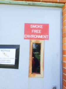 The Rosebud Sioux Tribal Building has red signs posted at the entrances declaring the building a "Smoke Free Environment" yet employees are allowed to smoke inside the furnace room. 